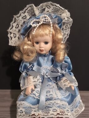 Porcelain Fashion Doll in Light Blue Lace Dress
